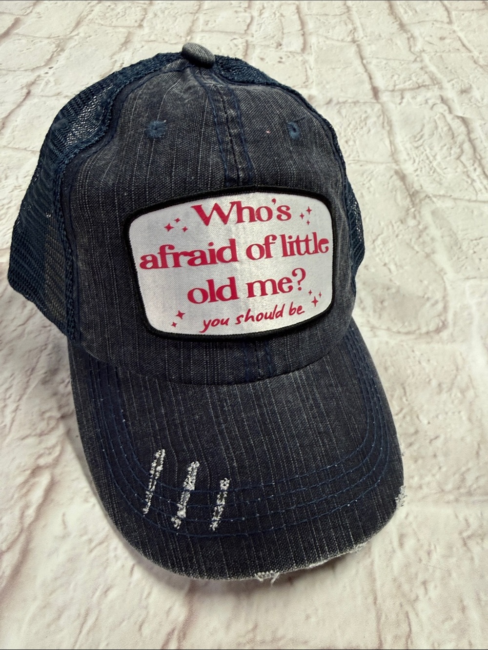 Who’s Afraid of Little Old Me? Women’s Navy Patch Trucker Hat with Ponytail hole